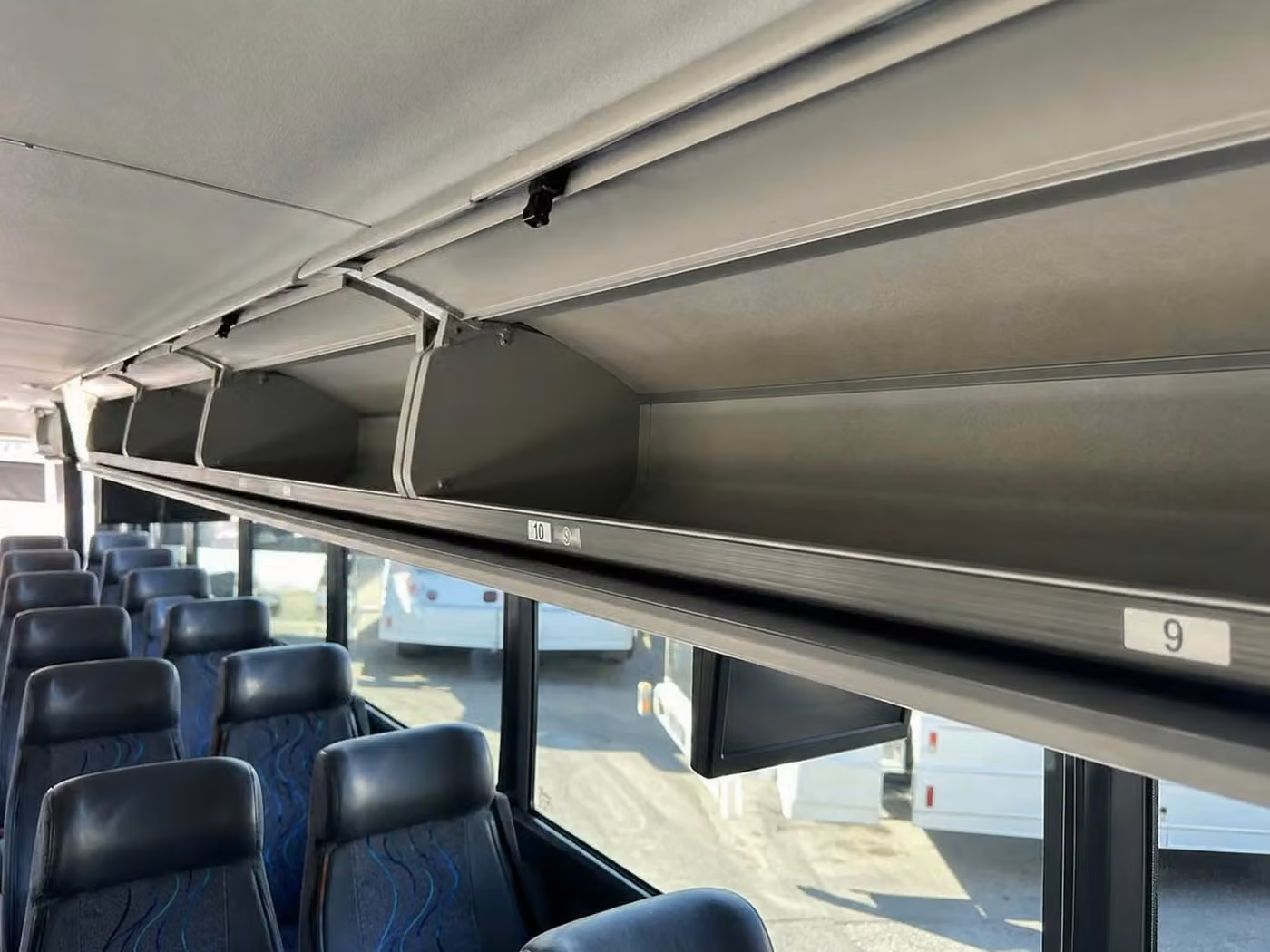 stockbridge 18 passenger minibus overhead storage