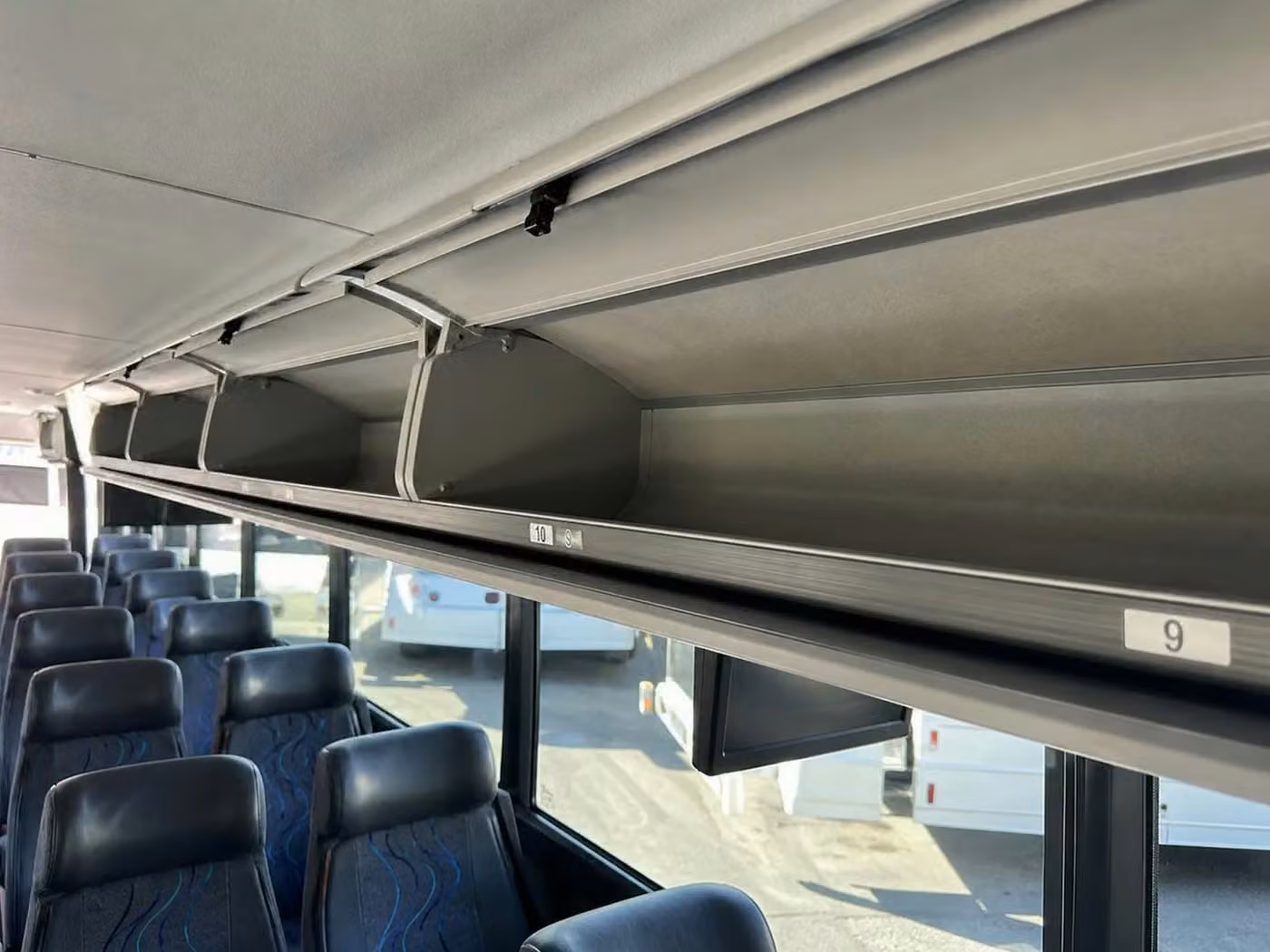stockbridge charter bus overhead storage